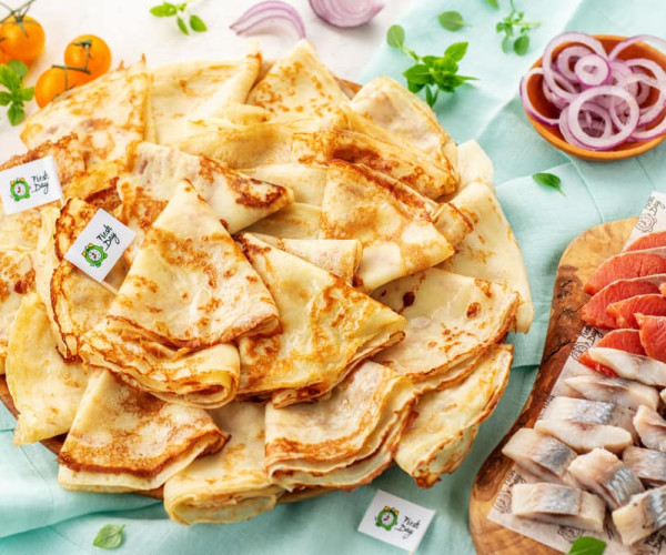 Блины с сельдью и красной рыбой 50 шт.